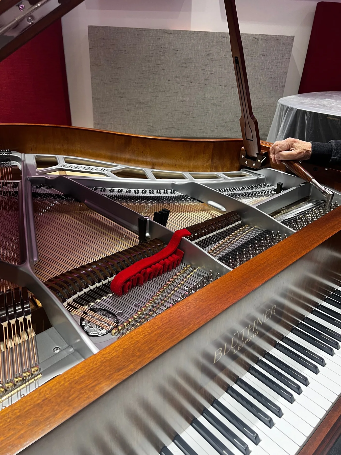 Careful work on a grand piano’s action in the workshop